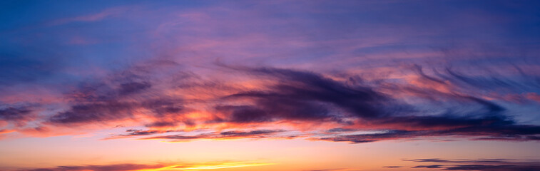 Obraz premium Backgrounds and textures. Beautiful and dramatic colorful sky with clouds at sunset. Sky texture. Abstract nature background.