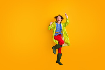 Fototapeta na wymiar Full length photo portrait of lucky girl cheering jumping up isolated on bright yellow colored background