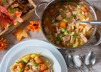 Pot of stew with vegetables and meat