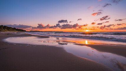 Colorful sunset above the sea, harmony and tranquility
