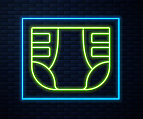 Glowing neon line Adult diaper icon isolated on brick wall background. Vector.