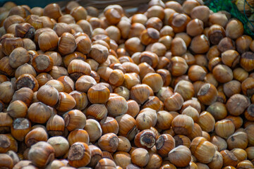 Fresh bio hazelnuts in a street market ready for selling and eating in autumn