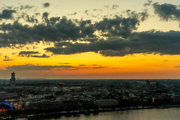 Naklejka premium Germany, Cologne, a group of clouds in the sky over a body of water