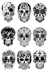 Mexican holiday Day of the Dead Celebration Festival and Halloween. Sugar skulls set  for poster, card, print, emblem, sign, tattoo, t-shirt, background.  Black and white vector illustration