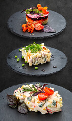 Set of salads on a dark background. Shuba salad, Olivier salad, crab meat salad.