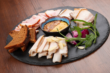 Set of pork lard various types, with garlic, onion and mustard