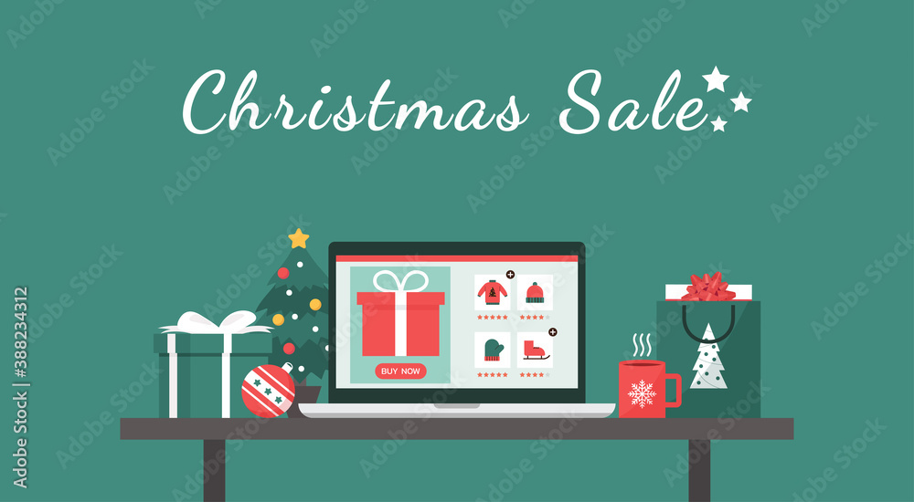 Wall mural christmas online shopping or winter holiday sale concept on a laptop screen with gift boxes, shoppin