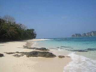 The beautiful beaches and limestone cliffs on Phi Phi island in Thailand