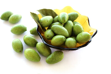 Natural green olives in a bowl