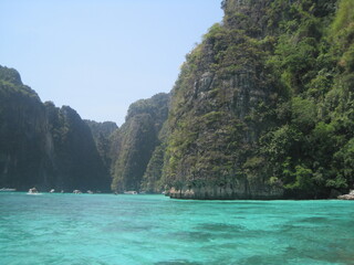 Naklejka na ściany i meble The beautiful beaches and limestone cliffs on Phi Phi island in Thailand