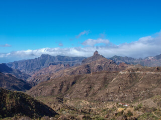 Landscape of Gran Canaria with mountains, valleys, clouds at Canary Islands, Spain (no people)