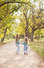 Fototapeta premium Two happy children having fun outdoors.