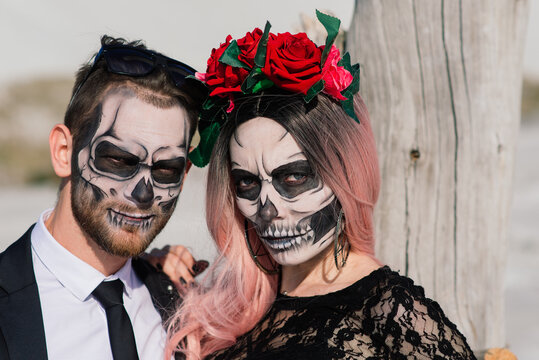 Evil day of the dead undead couple posing