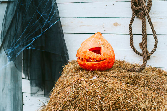 Jack O Lantern On The Porch Of A House Decorated To Celebrate A Halloween Party