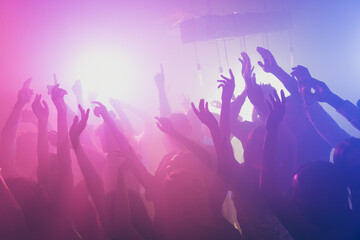 Photo of big group many people funky event stage dj concert neon bright pink spotlight modern club...