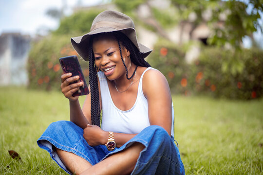 image of african lady with phone-out door concept