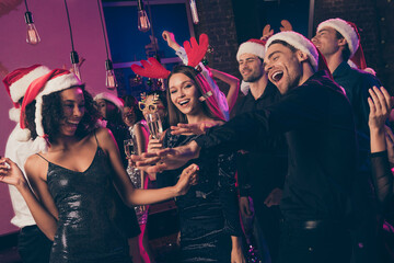 Photo of cheerful people celebrate open mouth lady laugh dance discotheque hold glass modern club...