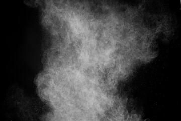 Flying white powder on isolated black background, dust debris. Creative hurricane storm tornado concept, copy text space. Dark sand abstract screensaver, explosion burst high quality texture