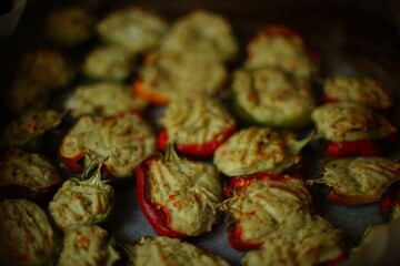 slices of pepper in half with mashed potatoes and carrots filling after bake in oven.
