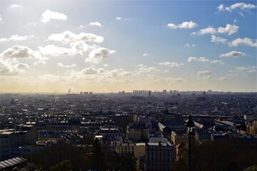 Fototapeta premium Panoramic view of Paris during sunny day. Skyline and top view of Paris from famous Eiffel Tower