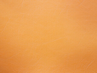 Genuine leather texture natural pattern. Orange color