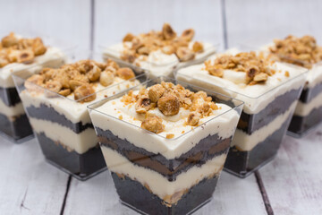 Chocolate trifle with cheese cream, salted caramel and caramel hazelnuts