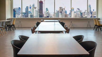 Modern office with open space to work thought the window and background city.