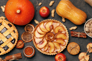Berry tart pie and apple tart pie on black background © fotofabrika