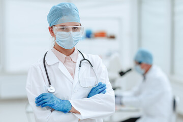 close up. serious woman doctor standing in a medical laboratory.