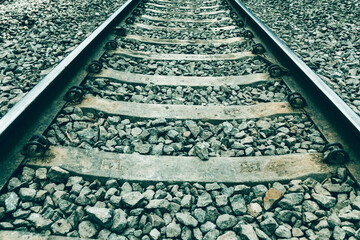 Background with gravel and railroad line. Old railroad. toned