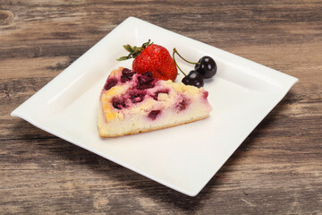 Cheesecake with cherry served strawberry