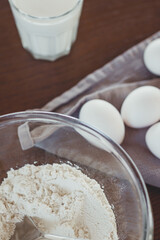 Pancake baking process. Ingredients for dough, baking pancakes on a quick breakfast.