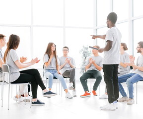 Fototapeta premium speaker asks questions to the audience of the business seminar.