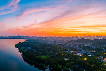 Beautiful West Lake and city skyline in Hangzhou at sunrise,China.aerial view.