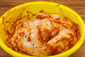 Raw marinated chicken for cooking