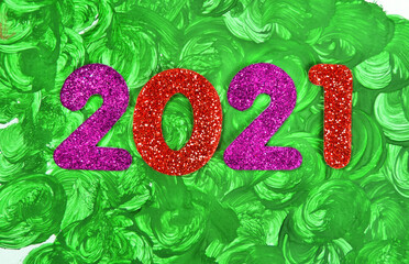 2021 decorative shiny new year numbers, hand drawn abstract stains green background