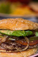 burger with sauce on a plate