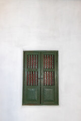 Obraz premium Historic adobe building with door