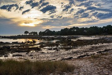 Stormy sunset on the beach