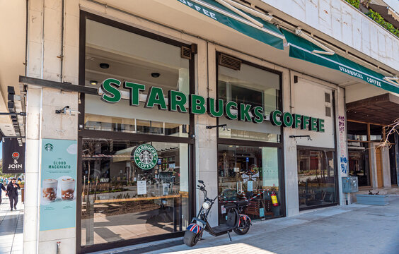 Thessaloniki, Greece - Martch 21, 2020: Facade of empty Starbucks Cafe. Starbucks Corporation is an American global coffee company and coffeehouse chain.