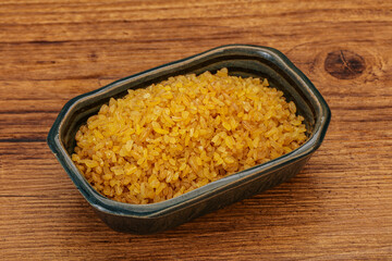 Vegetarian cuisine - dry bulgur for cooking