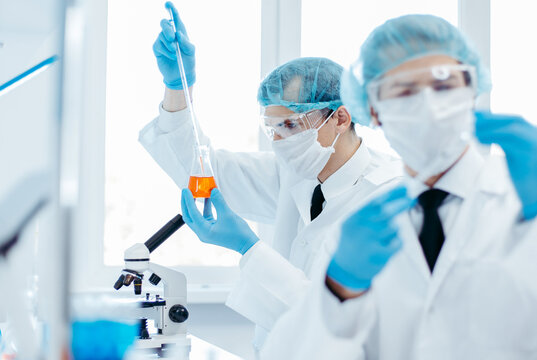 close up. group of scientists work in a medical laboratory .