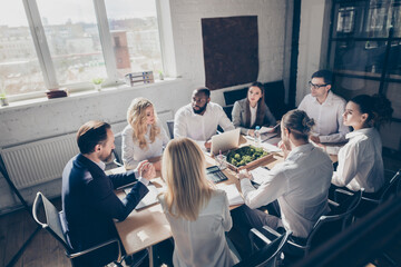 Photo of eight business people diversity race age colleagues sit table anti crisis corona crash...