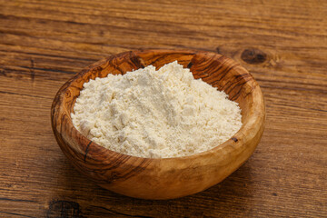 Wheat flour heap in the bowl