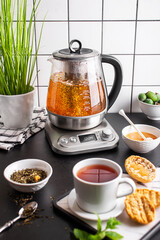 
electric teapot on the kitchen table