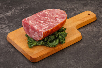 Beef ham piece over board