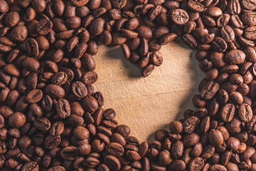 coffee bean heart on a wooden background