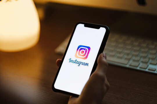 Woman use instagram app, instagram logo on the screen. Rostov-on-Don, Russia. 25 February 2020