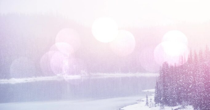 Animation of winter scenery landscape with light spots lake and fir trees covered in snow