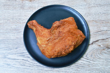 crispy fried chicken tight and leg on plate